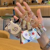 Cute mini leather bag, coin purse, earphone case, storage bag, monogram pendant, key card case, key case for women details Picture